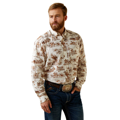 Man wearing a patterned shirt and jeans on a white background