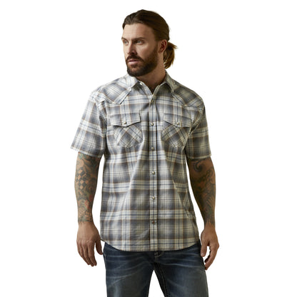 Man wearing a plaid short-sleeve shirt on a white background