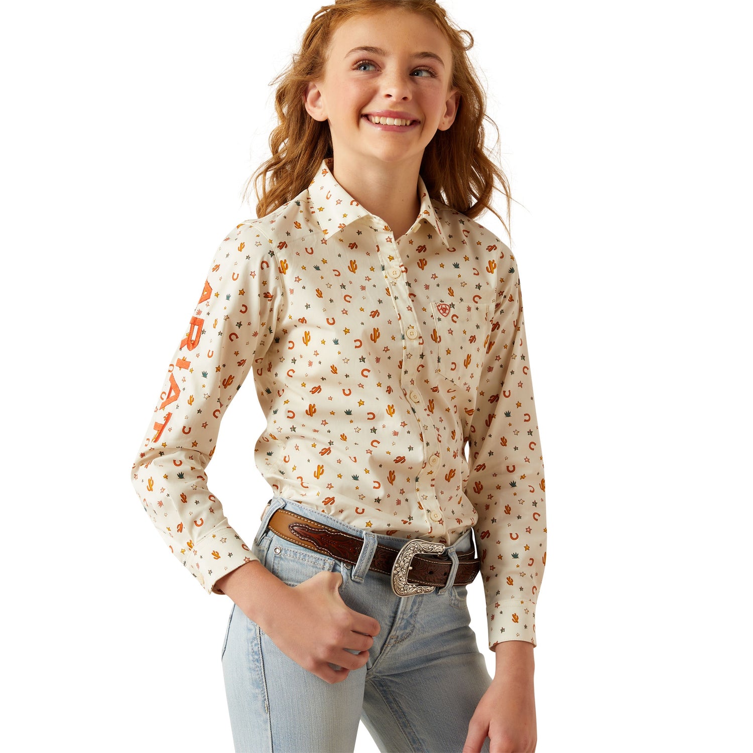 Young girl wearing a floral blouse and jeans on a white background