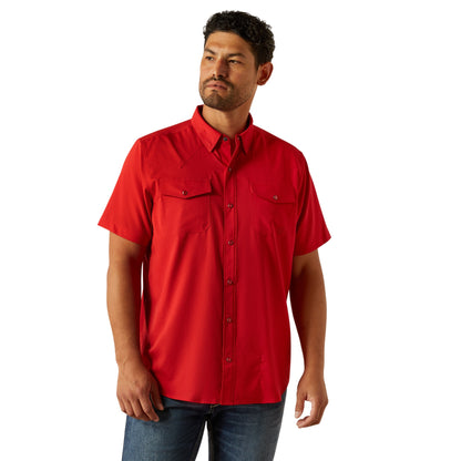 Man wearing a red short-sleeve shirt on a white background
