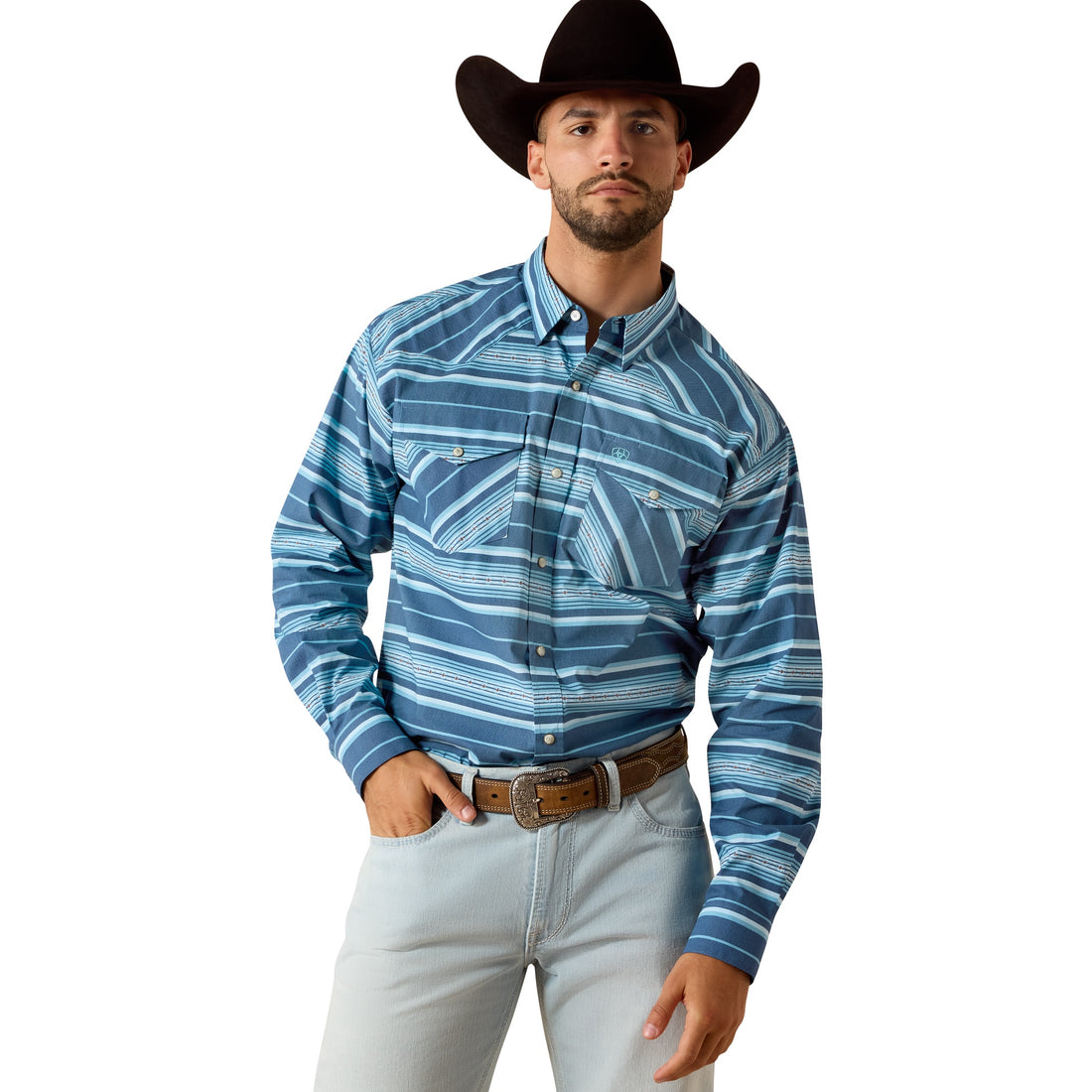 Man wearing a blue patterned shirt, light jeans, and a cowboy hat on a white background