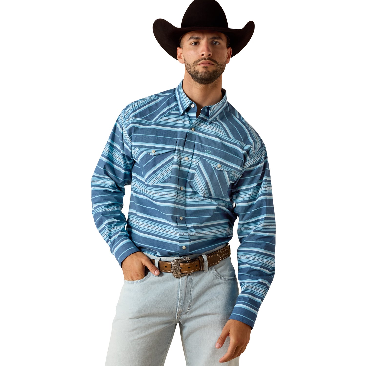 Man wearing a blue patterned shirt, light jeans, and a cowboy hat on a white background